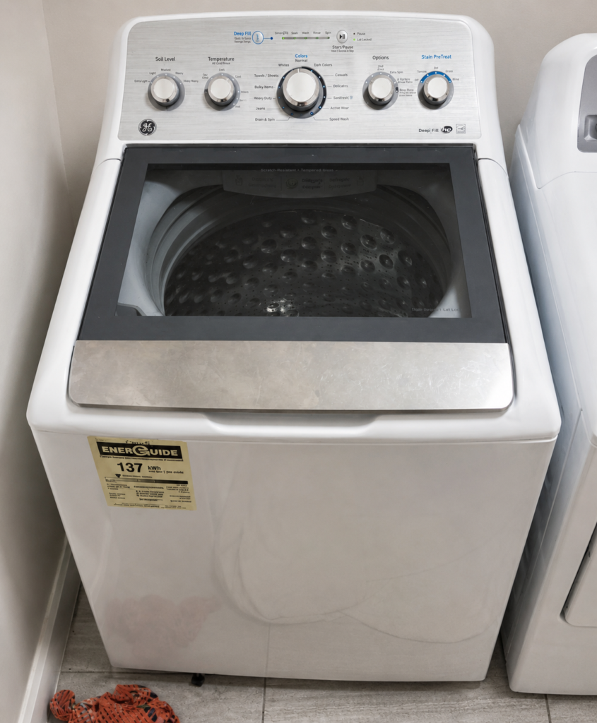Washing machine installed in a laundry area.